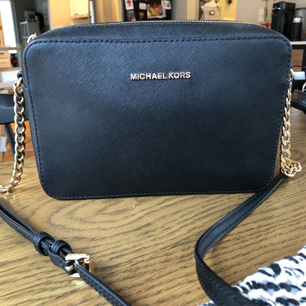 Like-new Black Leather Michael Kors Jet Set Crossbody with Gold Tone Hardware